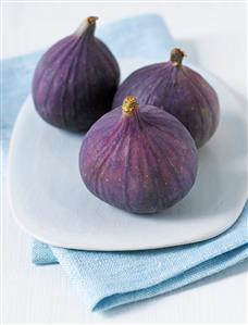 Three figs on plate