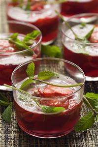 Rhubarb soup with strawberries and fresh mint