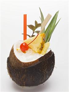 Piña colada in hollowed-out coconut