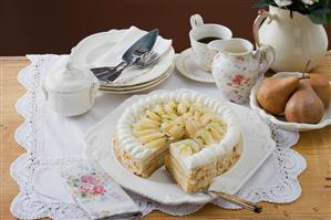 Pear cake with flaked almonds to serve with coffee