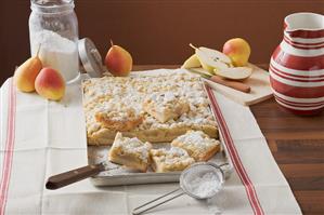 Pear crumble cake on baking tray