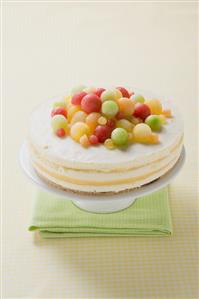 Yoghurt cheesecake with different coloured melon balls