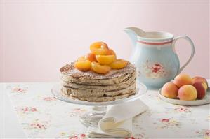 Baumkuchen cake ('Tree cake') with peaches