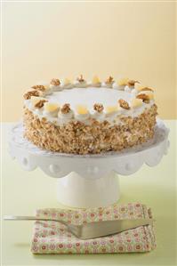 Apple and walnut cake on cake stand