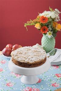 Apple crumble cake with icing sugar