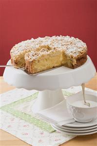 Apple crumble cake with icing sugar