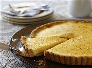 Lemon tart, a piece cut