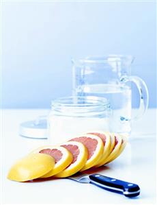 Pink grapefruit slices, water and sugar (for candying)