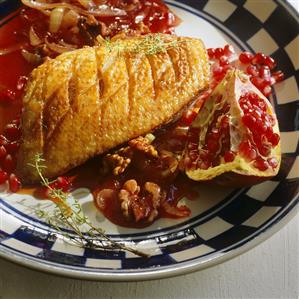 Duck breast with pomegranates and walnuts