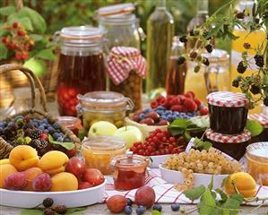 Still life with fruit, preserves and bottled fruit