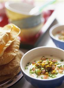 Indian yoghurt soup with vegetables, ginger and chives