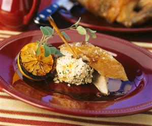 Chicken with rice and citrus fruit stuffing