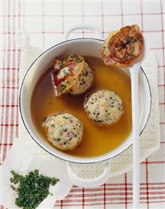 Meat broth with bacon dumplings