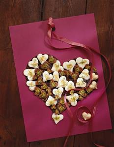 Lemon hearts and dark marzipan hearts with pistachios