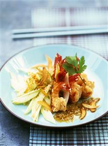 Sautéed prawns with garlic, green mango and sesame oil