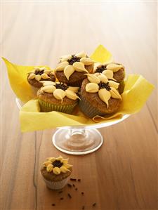 Orange nut muffins with orange cream & chocolate sprinkles