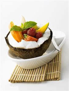 Fruit salad in coconut half