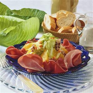 Cabbage salad with oranges and ham