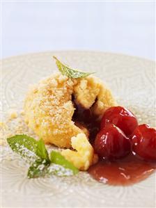 Semolina dumpling with cherries