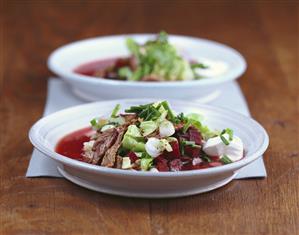 Red cabbage soup with strips of steak