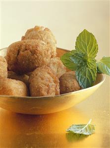 Deep-fried banana and coconut balls (India)