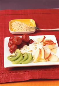 Fruit salad with almond cultured milk