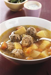 Broth with potatoes, carrots and forcemeat dumplings