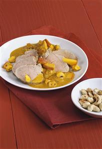 Pork fillet with curried apple sauce and cashew nuts