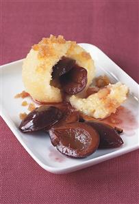 Plum dumpling with buttered breadcrumbs