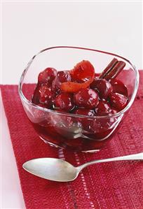 Sour cherry compote with cinnamon stick