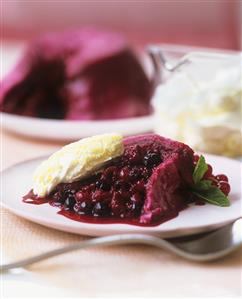 Bread pudding with berries and clotted cream