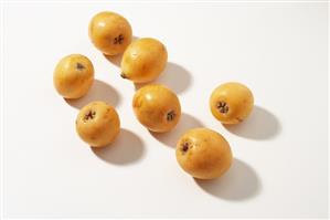 Whole unpeeled medlars