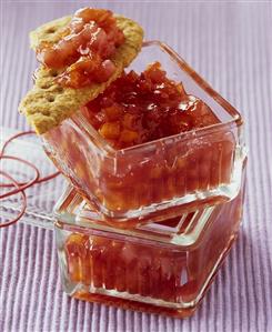 Pear, nectarine and plum jam in square glass dishes