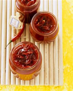 Strawberry and chili jam in jam jars (1)