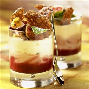 Fig and passion fruit dessert in glasses