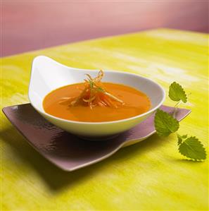 Carrot and lime soup in a soup plate