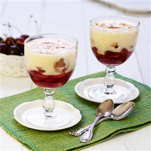 Zabaione and cherries layered in glasses