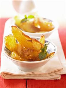 Caramelised apple wedges in batter