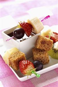 Chocolate fondue with fruit and honey bread