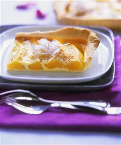 Piece of mango tart with puff pastry