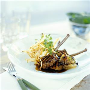 Grilled wild boar chops with cinnamon apple & straw potato