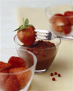 Spiced chocolate fondue with strawberries