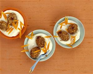 Baked chocolate eggs in yoghurt with flower petals