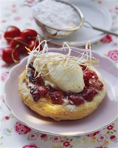 Hot cherry tart with vanilla ice cream