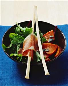 Roasted pumpkin with San Daniele ham and green salad