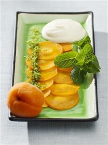 Apricot carpaccio with mint sugar and lemon cream