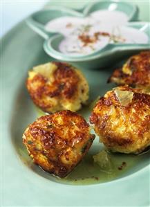 Exotic fish cakes with coconut and lime sauce