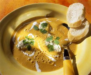 Orange and carrot soup with veal dumplings