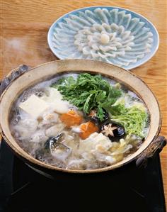 Japanese soup with blowfish and blowfish sashimi