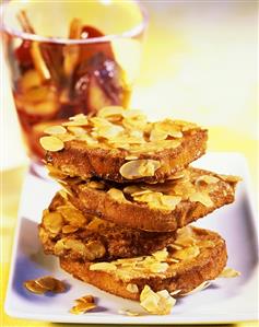 French toast with flaked almonds and plum compote